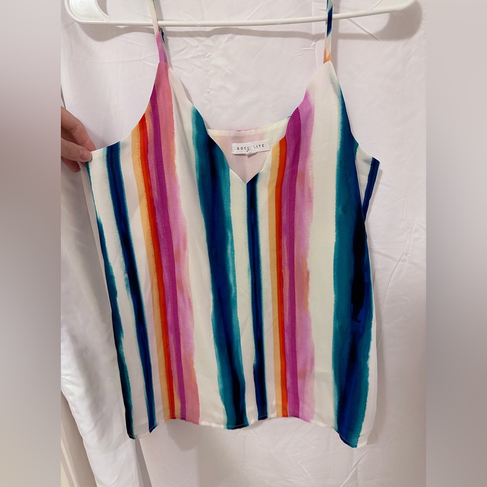 Multi color sleeveless blouse. Size M.